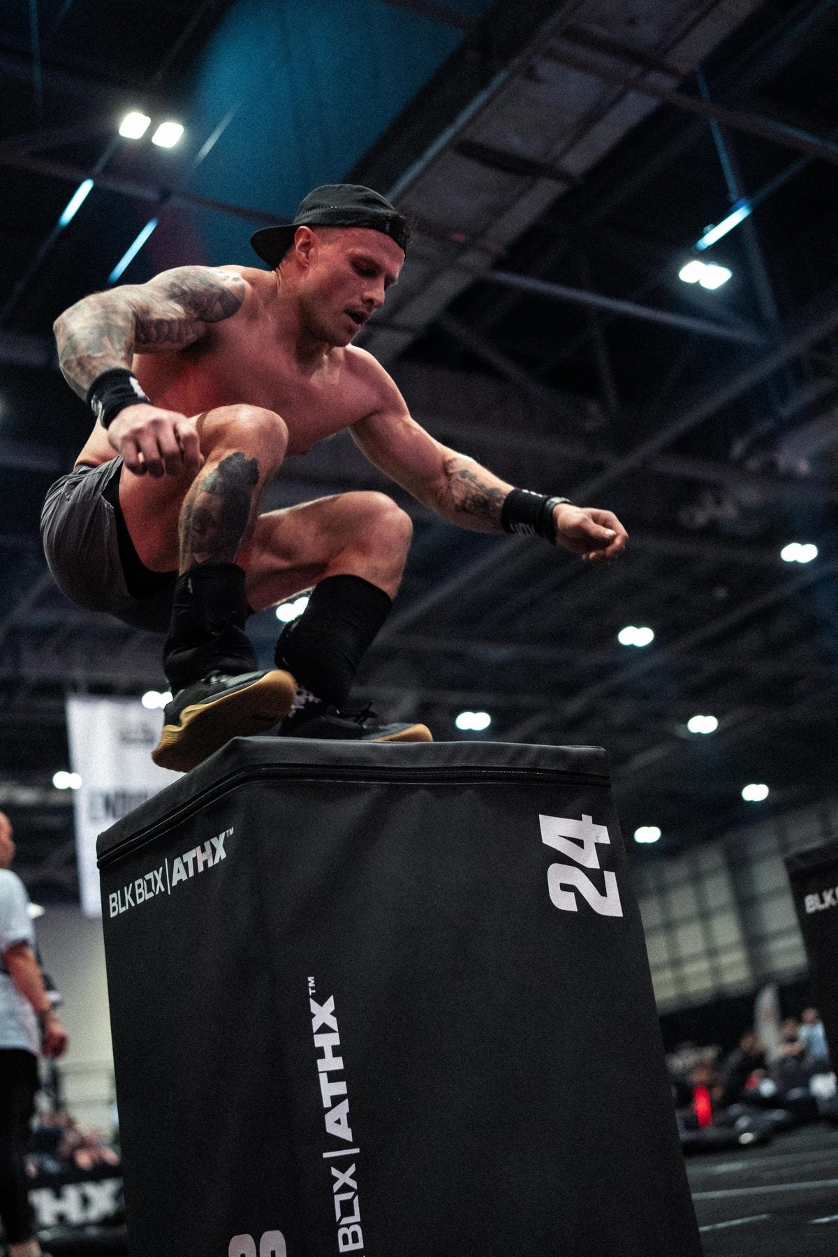 Athlete landing a box jump at ATHX