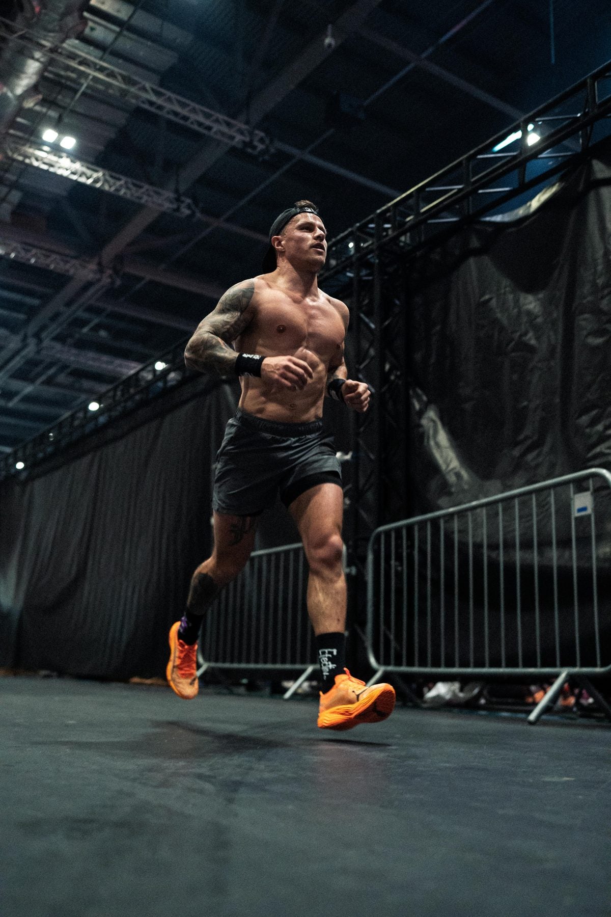 Athlete running between stations at ATHX